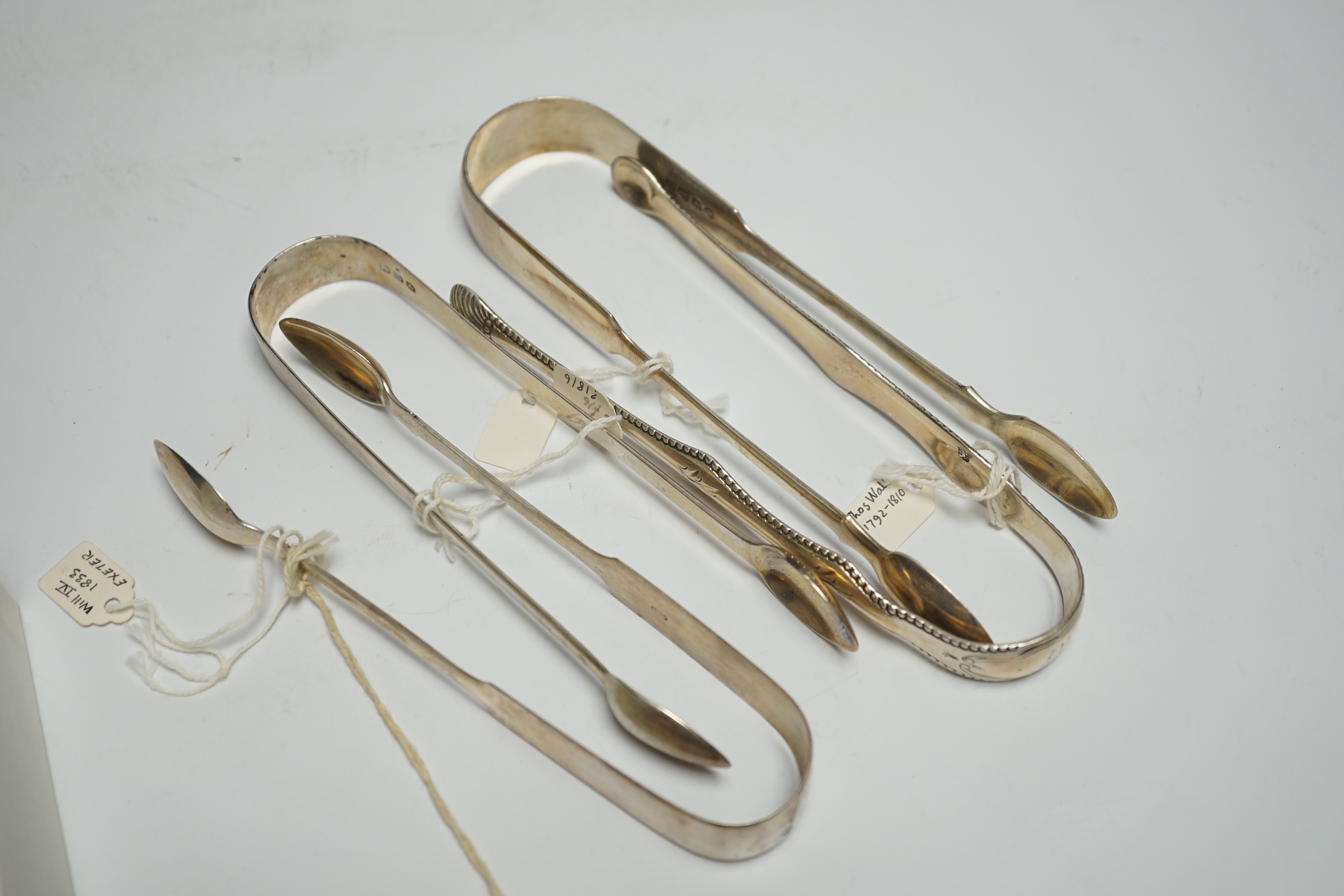 Eight assorted pairs of 18th and 19th century silver sugar tongs including Peter & Ann Bateman.